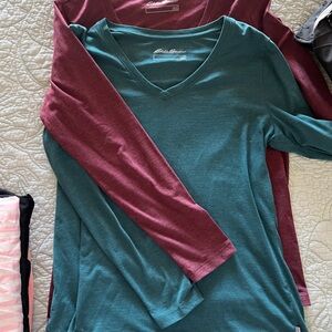 Two very nice women’s size L  Eddie Bauer V neck long sleeve T’s